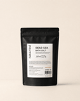 Jar of natural Dead Sea Bath Salt crystals rich in minerals for relaxation and skin health