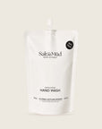 Salt & Mūd Exfoliating Hand Wash 500ml refill pouch in white 100% recyclable packaging, front view on a cream background
