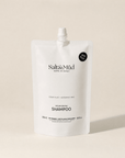 Refill shampoo bottle with Dead Sea minerals and Aloe Vera for hair hydration and repair