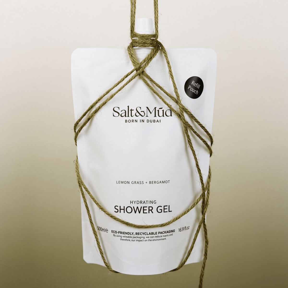 Salt & Mūd Refill Shower Gel with Dead Sea Minerals, white recyclable pouch hung with jute twine