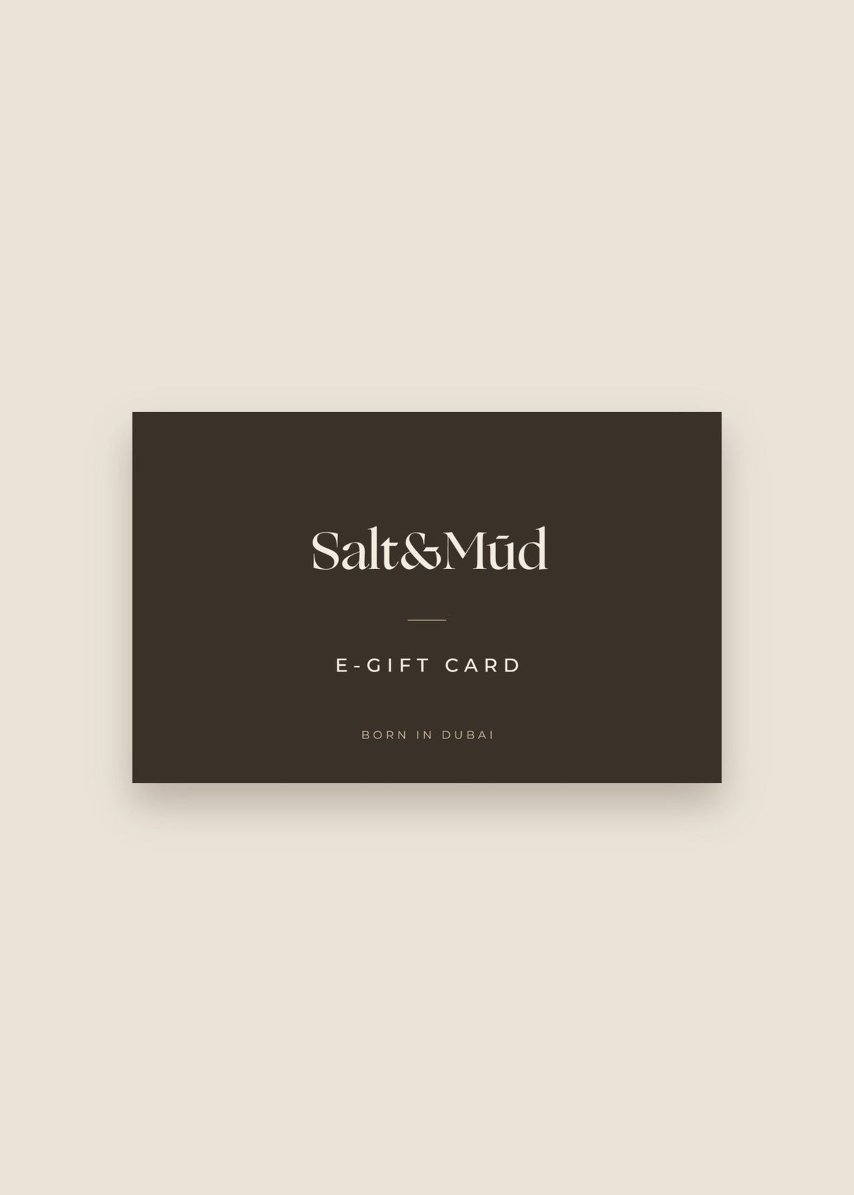 Salt &amp; Mūd E-Gift Card - dark brown card with the Salt &amp; Mūd wordmark on a cream background